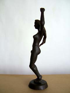 One of the wax originals One of the wax originals. Realistic female figure of a dancer in dark browm wax.